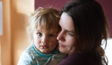 woman holding child