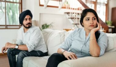 woman sitting and ignoring male partner