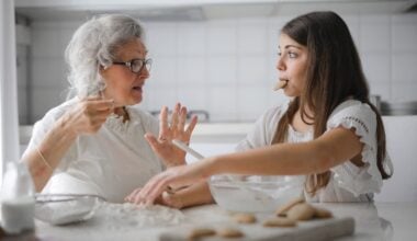 Granma and granddaughter making cookies